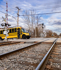 School bus and train tracks crossing - 757301989