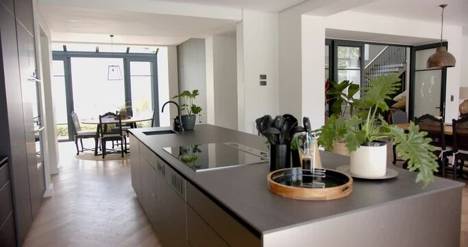 A modern kitchen with sleek countertops and stainless steel appliances