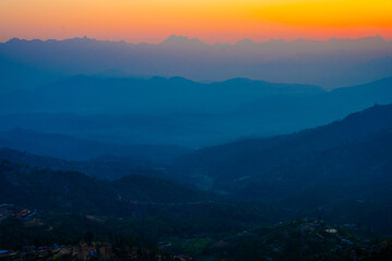 Dusk's Gradient over Dhulikhel, Nepal: Layered Mountain Silhouettes