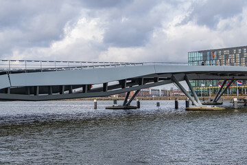 Amsterdam Jan Schaefer Bridge, spans Oostelijke Handelskade (Eastern Docklands) and Java Island. Amsterdam, The Netherlands. 