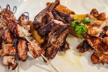 Souvlaki shashliks with onion on a plate Cyprus island country