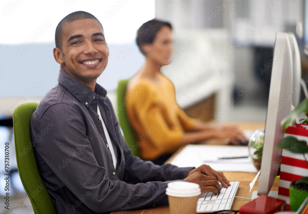 Poster portrait, smile and computer for happy employee, office and typing at desk in workspace. technology,