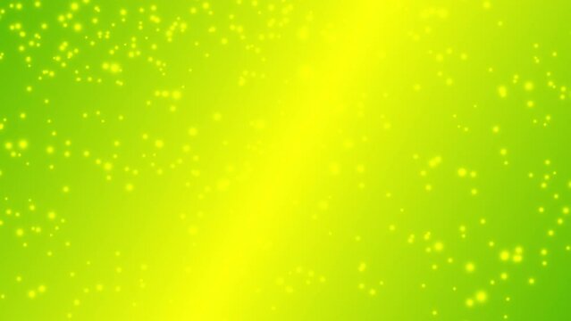 Mimosa color particles flowing in the wind on gold and green gradient abstract background.  Mimosa flowers.