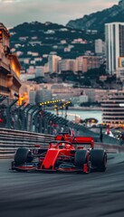 Naklejka premium Red Formula One race car driving on race track on blurred background showing buildings on sunset