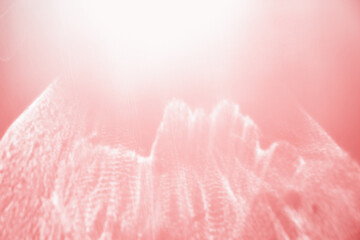 White shiny glare from sunlight on pink background, abstract nature photo with sunshine flare,...