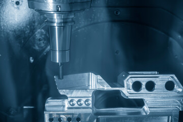 The 5-axis machining center cutting aerospace parts with solid ball end mill tool.