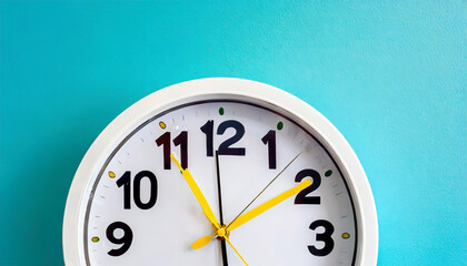 Part of white wall clock with yellow second hand hanging on wall. Close up image of plastic wall...