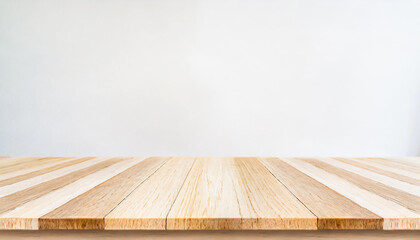 Real wood table top texture on white wall room background.For create product display or key ...