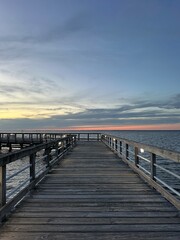 Sandestin Florida walking pier with sunset sky background 