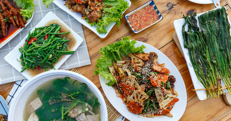 Mala restaurant food. grill fish with herbs, Spicy Century Egg Salad, Grilled Chives, choy soup, Spicy Braised Chicken Feet, mala style. China popular dish - obrazy, fototapety, plakaty