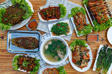Mala restaurant food. grill fish with herbs, Spicy Century Egg Salad, Grilled Chives, choy soup,...