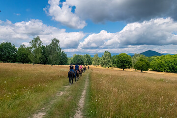 Horseback riding in the carpathian landscape