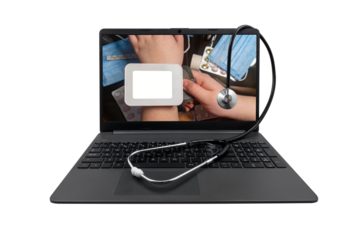Laptop and medical stethoscope on a transparent background. On the laptop screen - a tonometer with a blank white screen on the hand against the background of a table with medicines