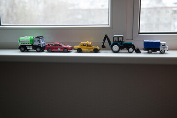 toy cars on the window