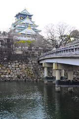 OSAKA, JAPAN - MARCH 13: Osaka Castle in Osaka, Japan on March 13, 2024. One of Japan's most famous and played a major role in the unification of Japan during the 16th century