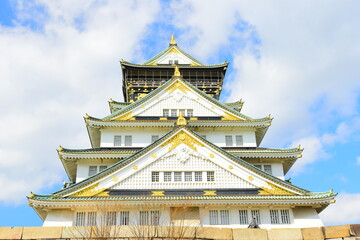 OSAKA, JAPAN - MARCH 13: Osaka Castle in Osaka, Japan on March 13, 2024. One of Japan's most famous and played a major role in the unification of Japan during the 16th century