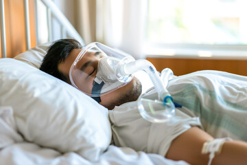 A young man wearing an oxygen mask, sleeping in a bed, recovering from an illness