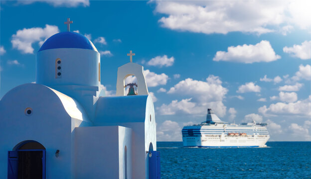 Traditional Greek Church Overlooking the Sea with a Cruise Ship in the Distance