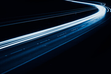 Fototapeta na wymiar blue car lights at night. long exposure