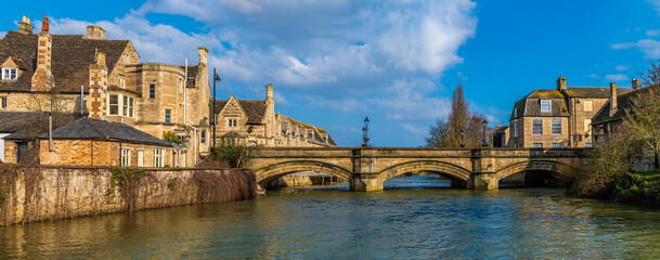 A view along the River Welland towards Stamford Bridge in Stamford, Lincolnshire, UK in springtime