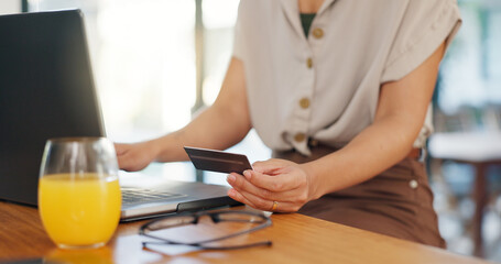 Woman, credit card and laptop in home for happy ecommerce, gambling or subscription at desk. Female person, technology and hands gesture for online shopping, booking or payment for traveling