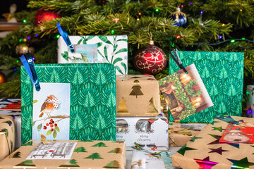 Christmas presents piled under the tree