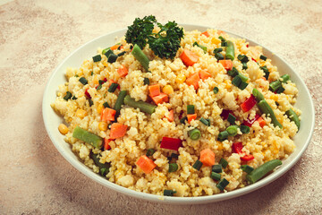 couscous with vegetables, paprika, carrots, string beans, corn, homemade, top view, no people,
