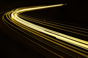 Papier Peint photo autocollant Autoroute dans la nuit yellow car lights at night. long exposure