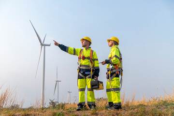 Engineer surveyor and manager wearing uniform walking holding box inspection and tablet work in...