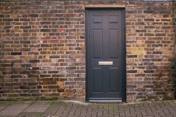 A new well appointed entrance to walled residential area in west London