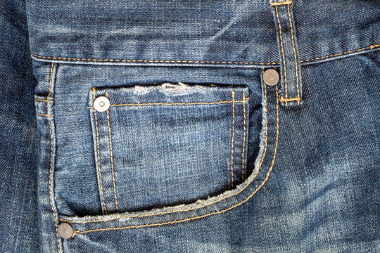 close-up detail of front pocket of jeans