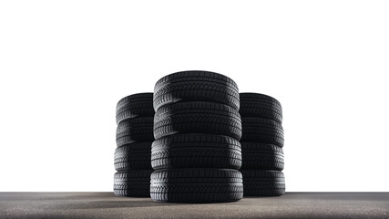 Car tires with a great profile in the car repair shop. Set of summer or winter tyres in front of...