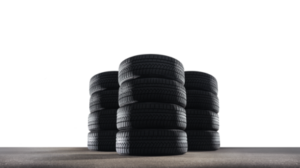 Car tires with a great profile in the car repair shop. Set of summer or winter tyres in front of white fond. On transparent PNG background.