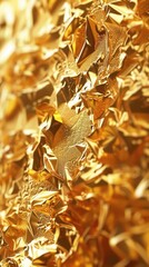 This image features a sharply crinkled golden foil, emphasizing the texture and angularity, evoking a sense of modern luxury