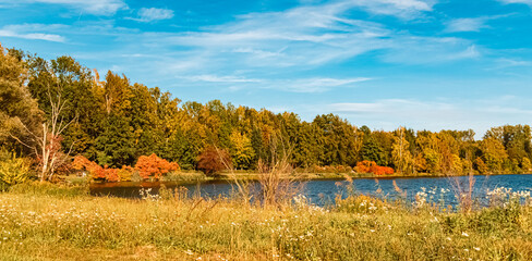 Autumn or indian summer view with reflections in a pond near Plattling, Isar, Deggendorf, Bavaria,...