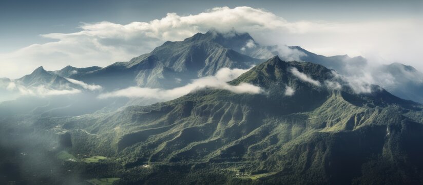 mountains with valley floors shrouded in fog and clouds in the morning