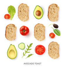 Creative layout made of bread, avocado, tomato , arugula and cucumber on the white background. Flat lay.