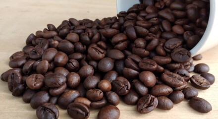 Coffee beans background. Close up of roasted coffee beans.