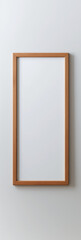 Straight medium shot of mockup presenting elegant, thin, wooden, horizontal, ractangle frame with white blank canvas, frame hangling on white wall, frame in the middle of photo, frame size