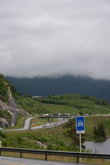 View of a highway and expressway in Norway in the mountains with freight transport