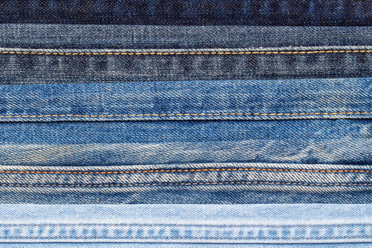Different seams of blue jeans close up