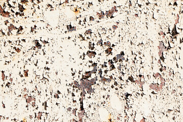 Rusty metal texture. Corrosion background. White peeling paint. Grunge rust on metal. Cracked paint pattern.