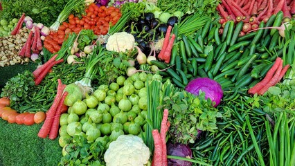 Food background with fresh assortment of  organic vegetables on vegetable market