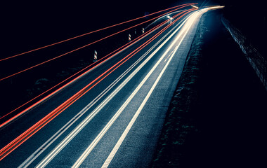 lights of cars driving at night. long exposure