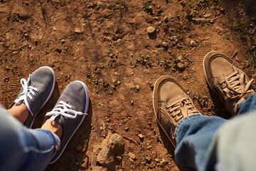 Shoes, hiking and people in nature for outdoor adventure, trekking or vacation trip to Canada. Travel, above view and person on holiday for explore, journey or healthy hobby in countryside pathway