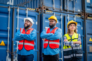 Portrait of Engineer or foreman team pointing up the future  with cargo container background at...