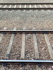 A railway track or railroad track, also known as a train track or permanent way, is the structure on a railway or railroad consisting of the rails, fasteners, railroad ties and ballast.
