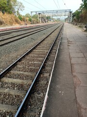 Obraz premium A railway track or railroad track, also known as a train track or permanent way, is the structure on a railway or railroad consisting of the rails, fasteners, railroad ties and ballast. 