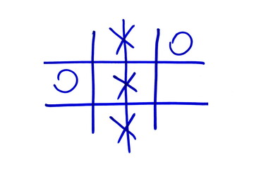The game "Tic Tac Toe" is drawn on white paper with a blue marker.