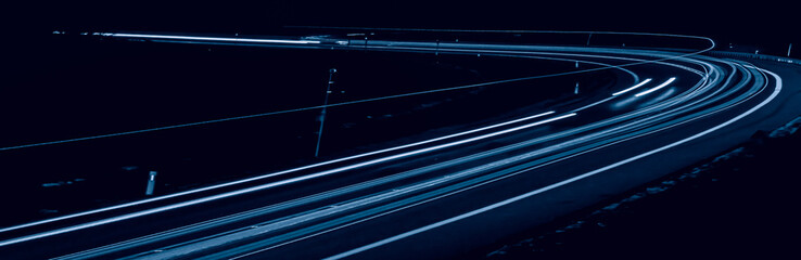 blue car lights at night. long exposure